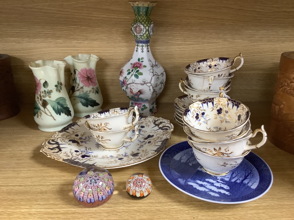 A Rockingham part teaset, c.1835, two glass paperweights, two glass vases and a French garlic neck vase